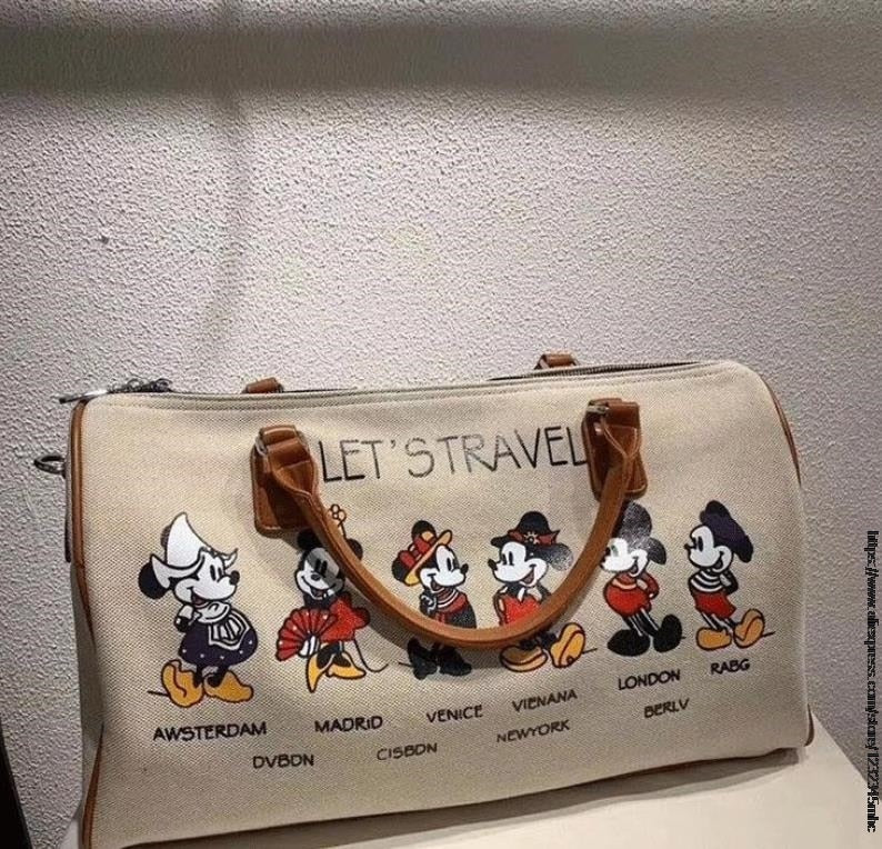 Bolsa de ombro temática Mickey: uma jornada pelo mundo